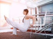 Staying healthy make your life better A girl doing workout with chair