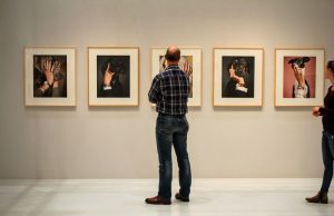 Shopping Alert – Artwork Will Be a Hot Trend in 2021 A group of people standing in a room