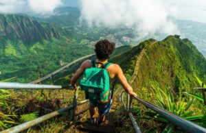 Enjoy your vacation at the best tourist spots A man wearing a bag and walk on bridge